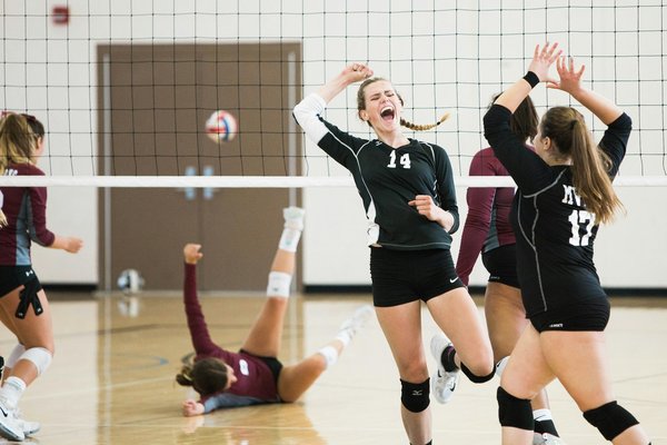 What Are the Key Components of a Comprehensive Warm-Up Routine for Volleyball Players?